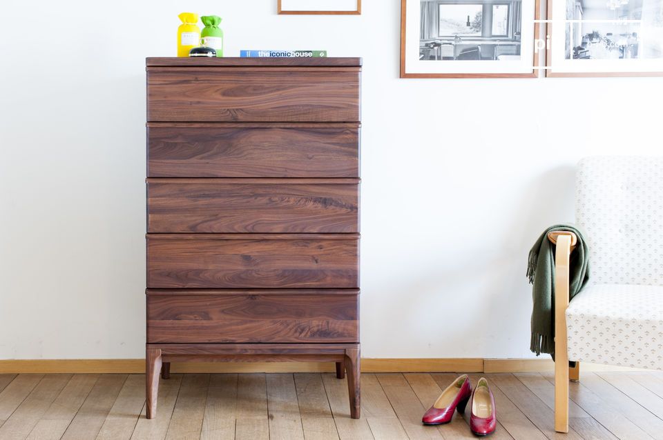 Elegant walnut wood chest of drawers.