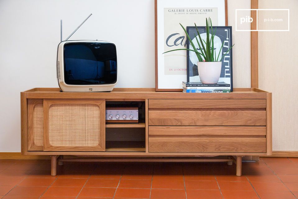 Sublime piece of furniture in light oak with a touch of cane.