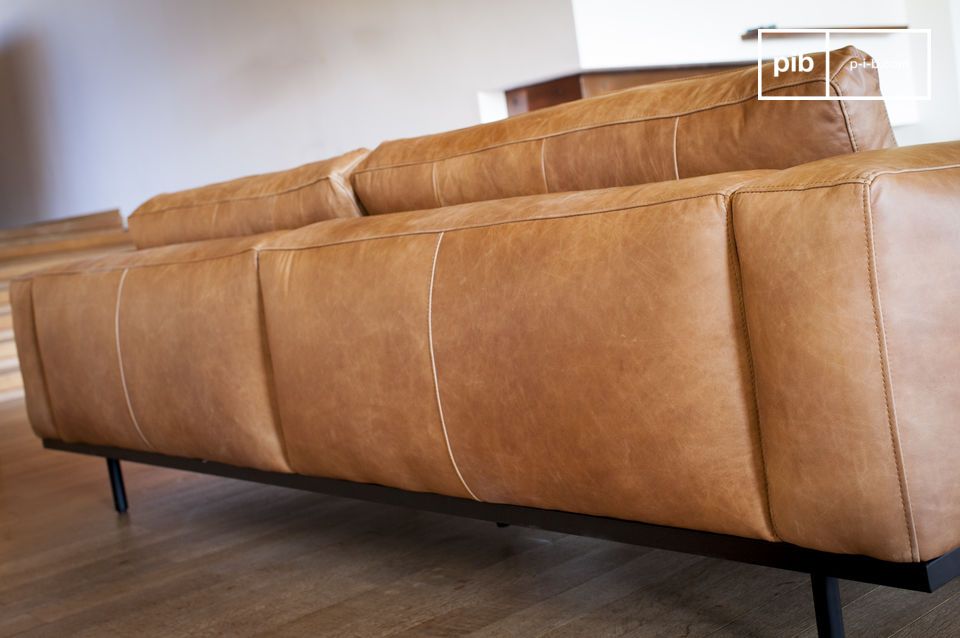 The back of the sofa is neatly finished, allowing it to be positioned in the centre of the living room.