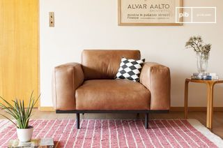 Almond armchair in brown leather