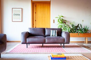 Almond sofa in grey leather