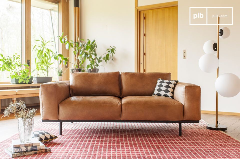 A sofa with nougat nuances reminiscent of the influences of the 60s.