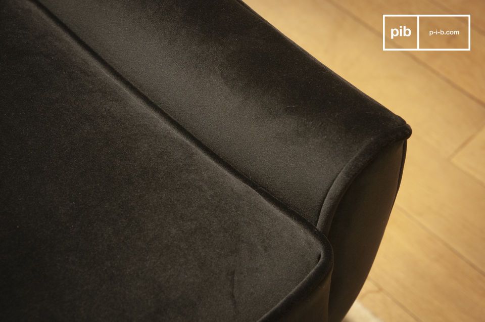 Black velvet armchair of superior quality.