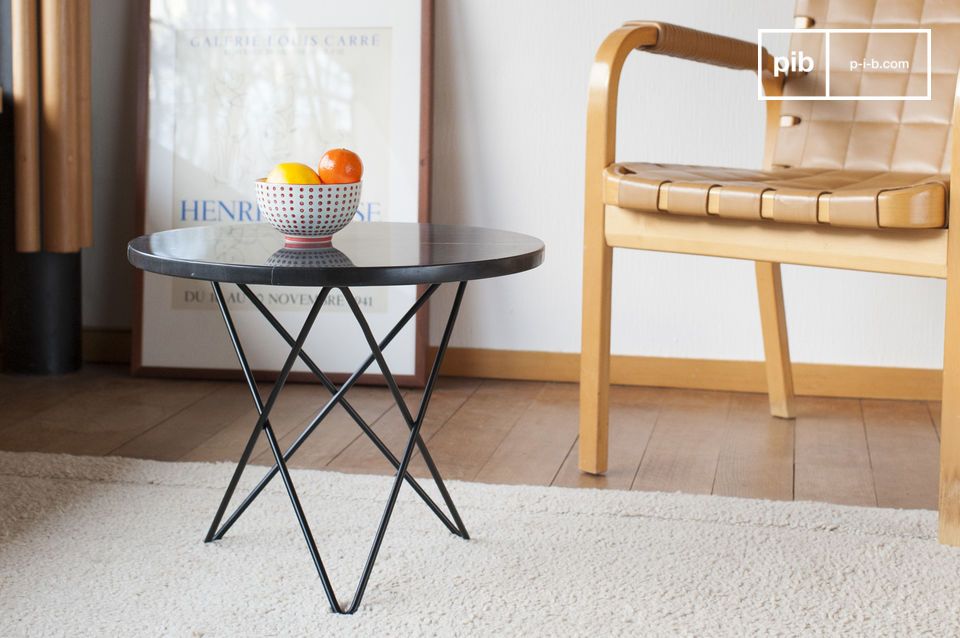 Small black marble side table with black metal structure.