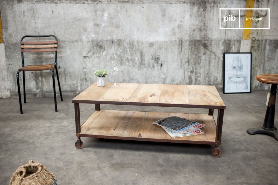 Table with two shelves on steel structure. Undeniably industrial.