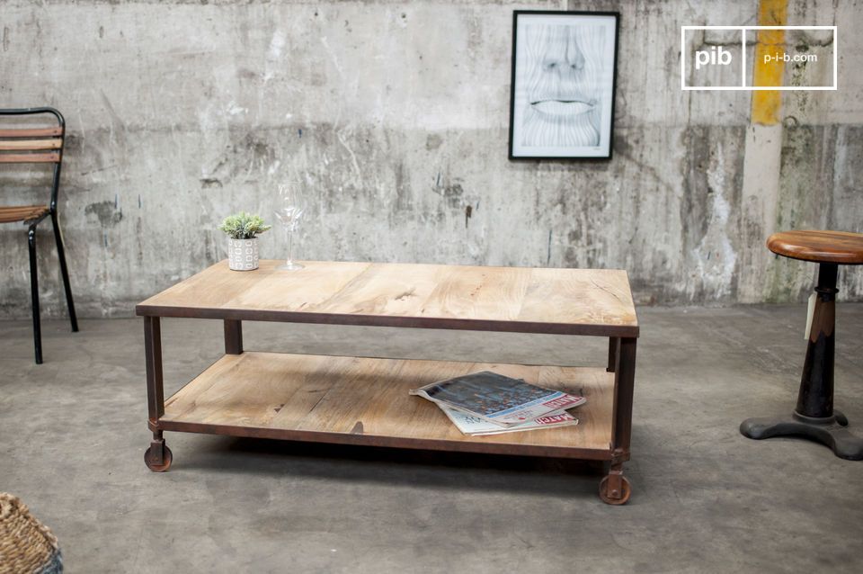 Table with two shelves on steel structure. Undeniably industrial.