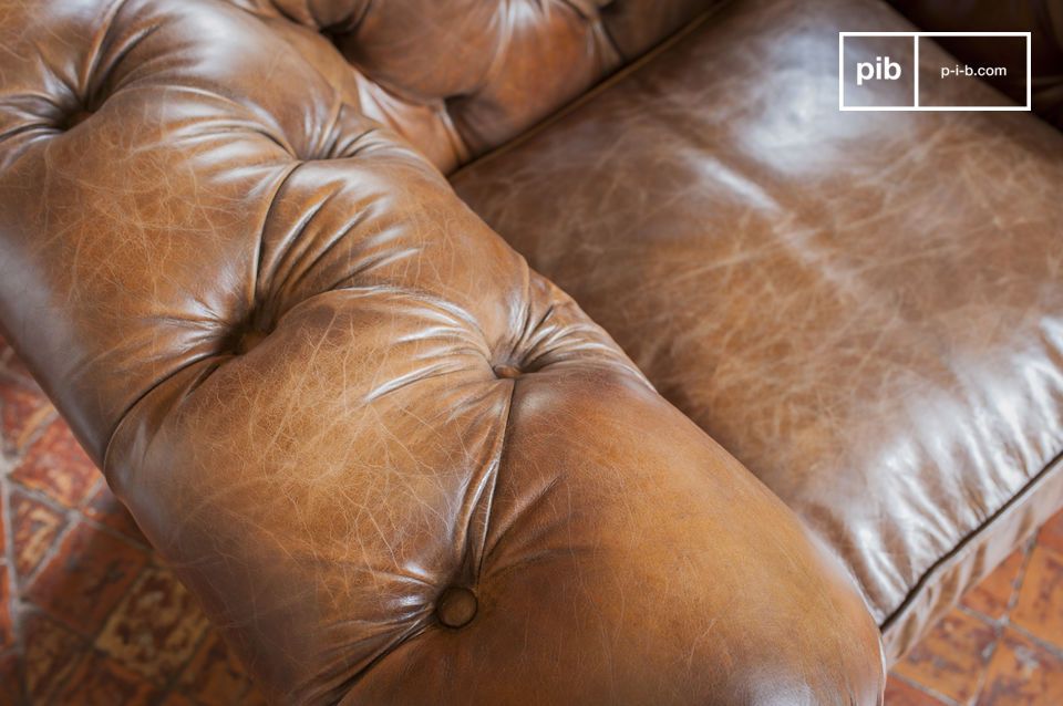 The full grain leather is slightly aged and retains the animal's marks.