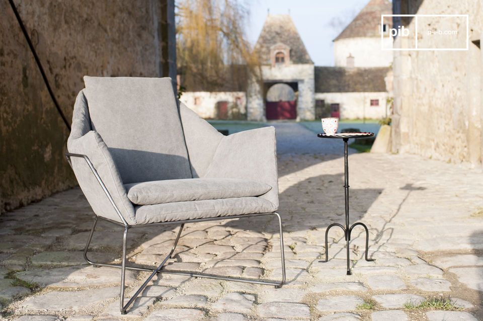 Exceptional armchair in washed grey canvas on a metal structure.