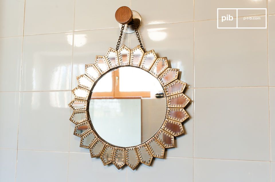 Beautiful brass mirror in the shape of a sun.
