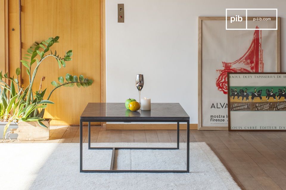 Nice coffee table with a marble top and metal legs.