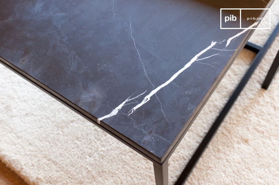 Matt black marble incorporates elegant white veins.