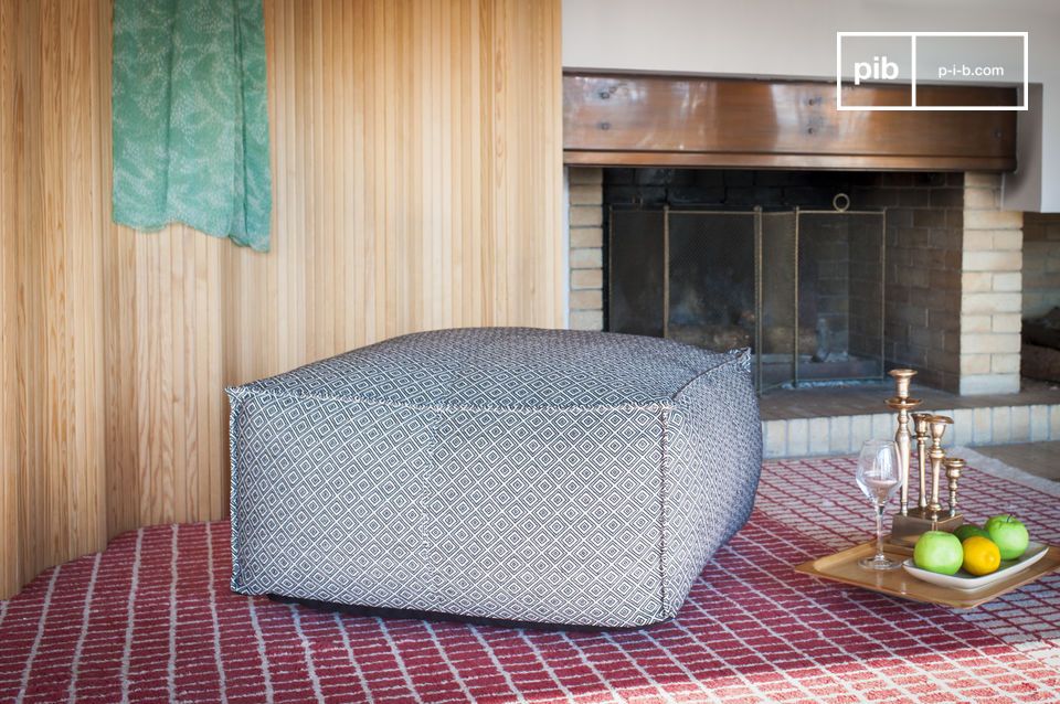 Large elegant black and white pouf with geometric patterns.