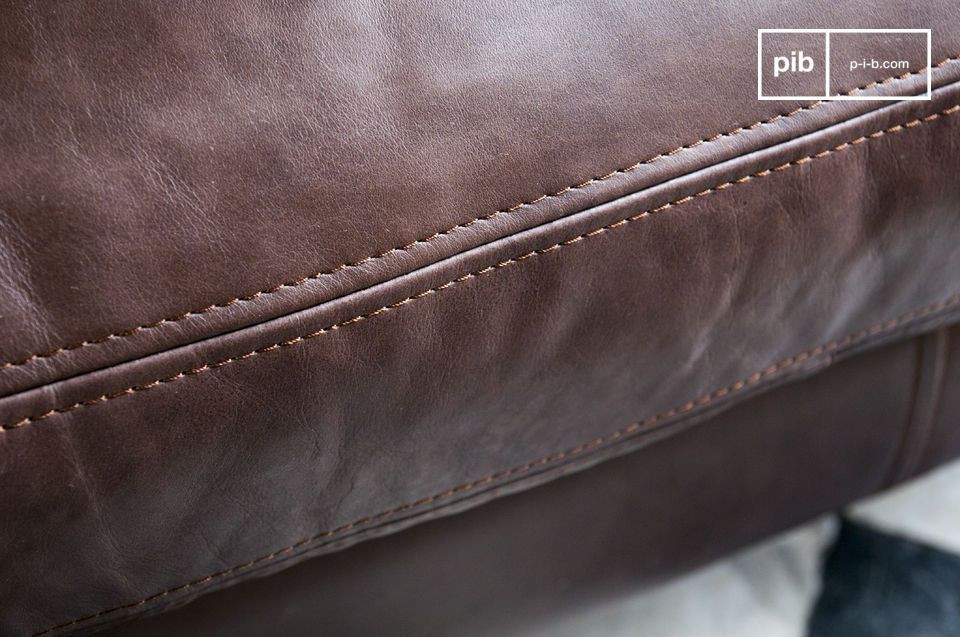 The dark leather of this sofa has been hand tanned.