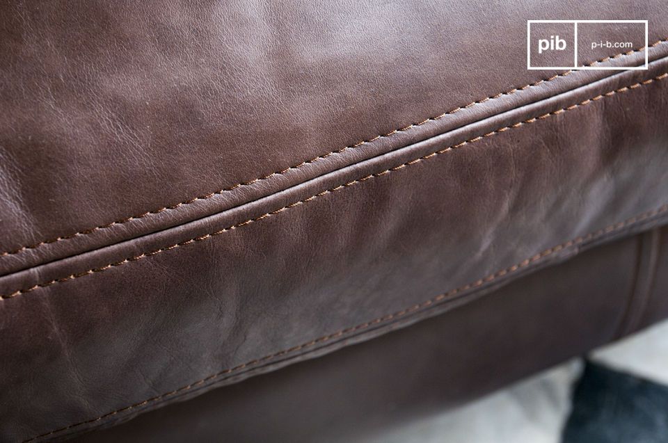 The dark leather of this sofa has been hand tanned.
