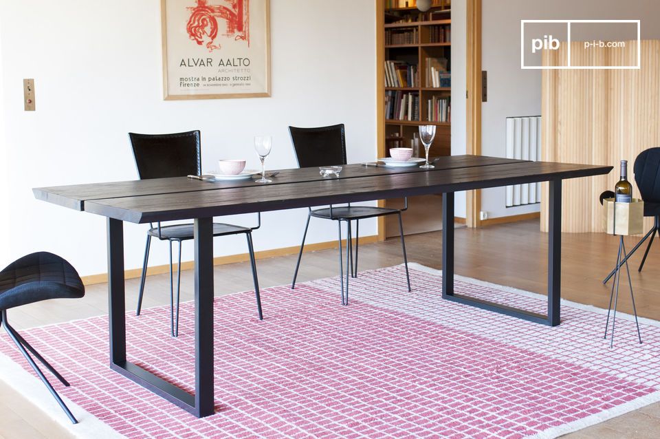 The dining table with a thick tinted ash top.