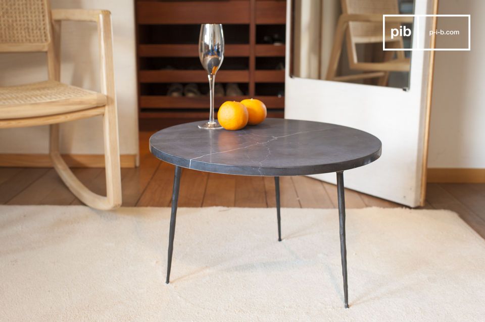 Superb round coffee table with a thick black marble top.