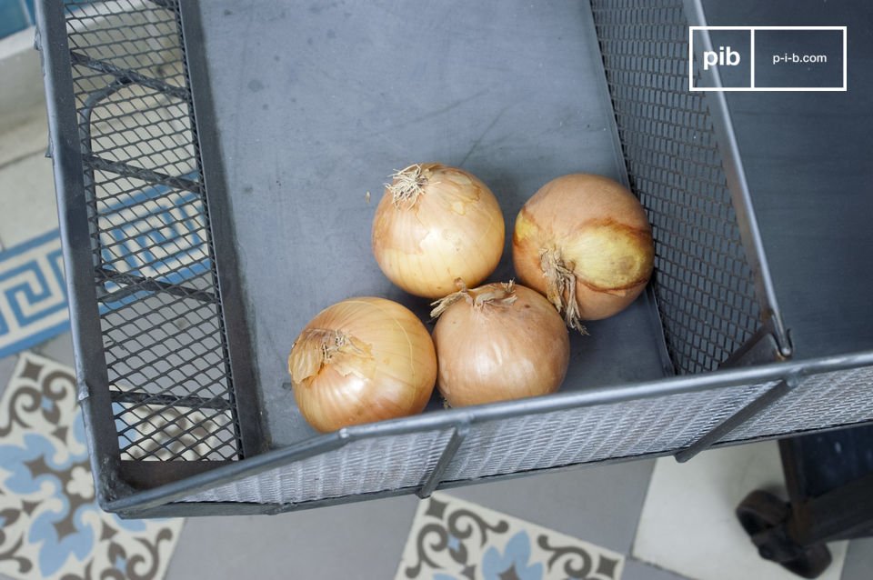 A metal basket that takes care of its onions.