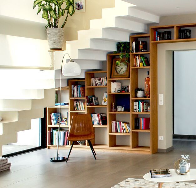 Book storage under stairs