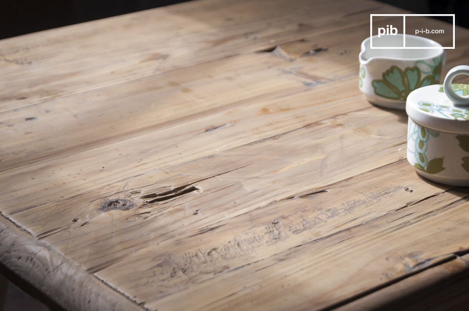 a coffee table made of waxed old solid wood.