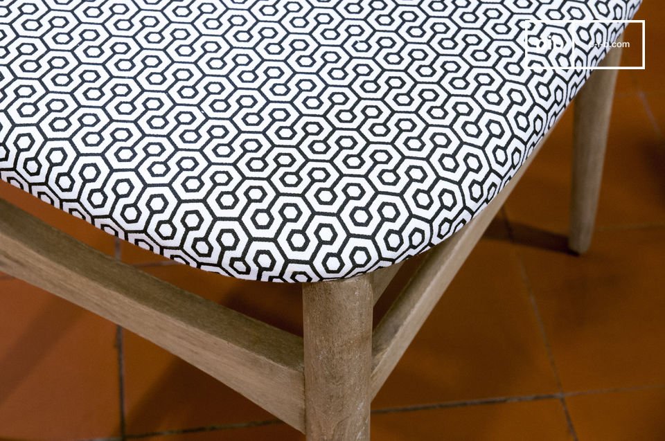 Beautiful black and white patterns decorate the chair.