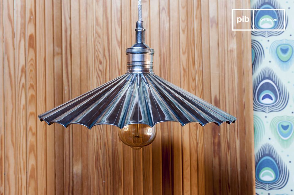 Metal suspended lamp with silver alloy plating.