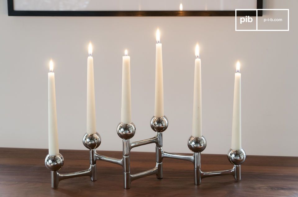 The candlestick can be positioned as you wish.