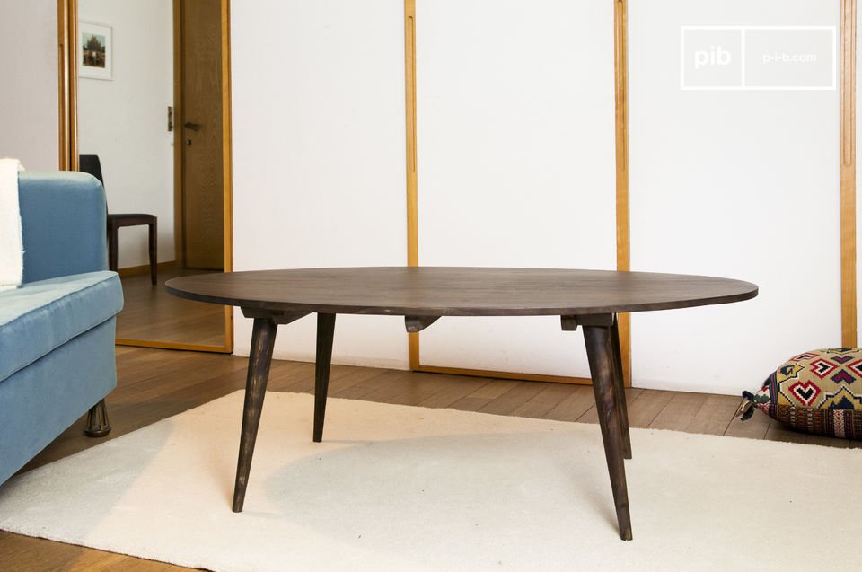 Beautiful dark table with pretty compass legs.