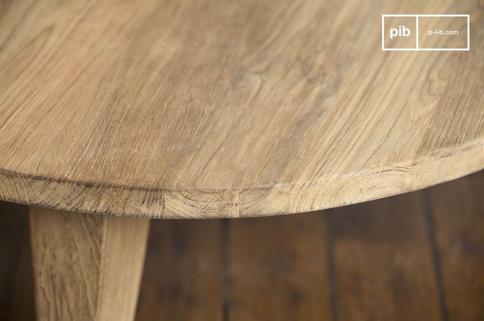 The table is made of light antique light teak with a slight texture.