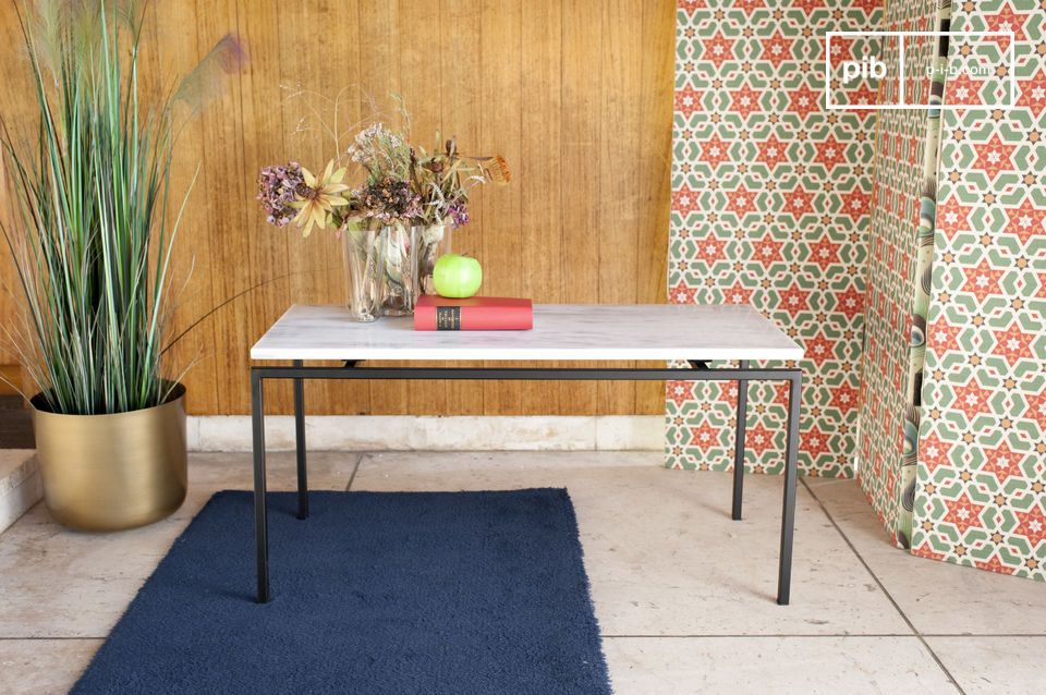 White and black rectangular table with a varnished top.