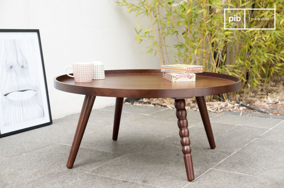 Elegant original coffee table with a wide top.