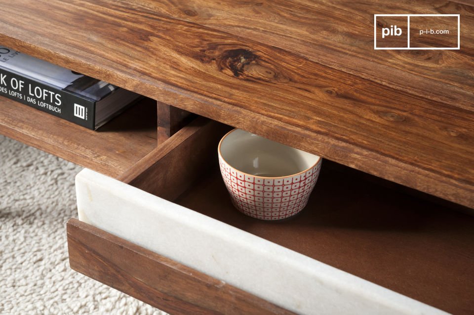 The table has two practical drawers.