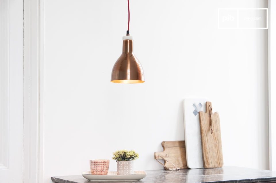 Pretty suspended lamp and marble and pink copper.