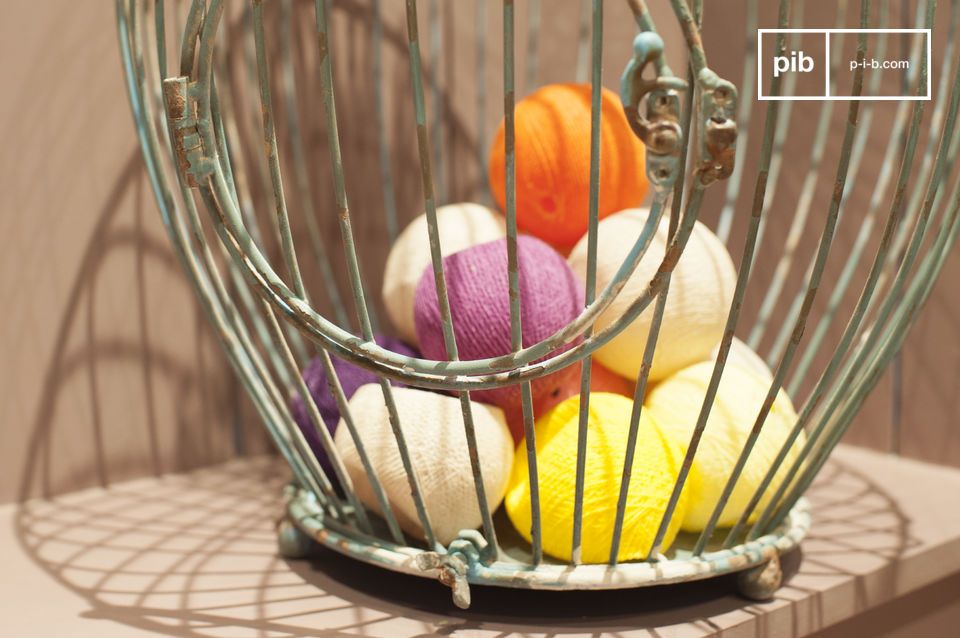 Add a natural retro flair to your interior with this charming and antique cage