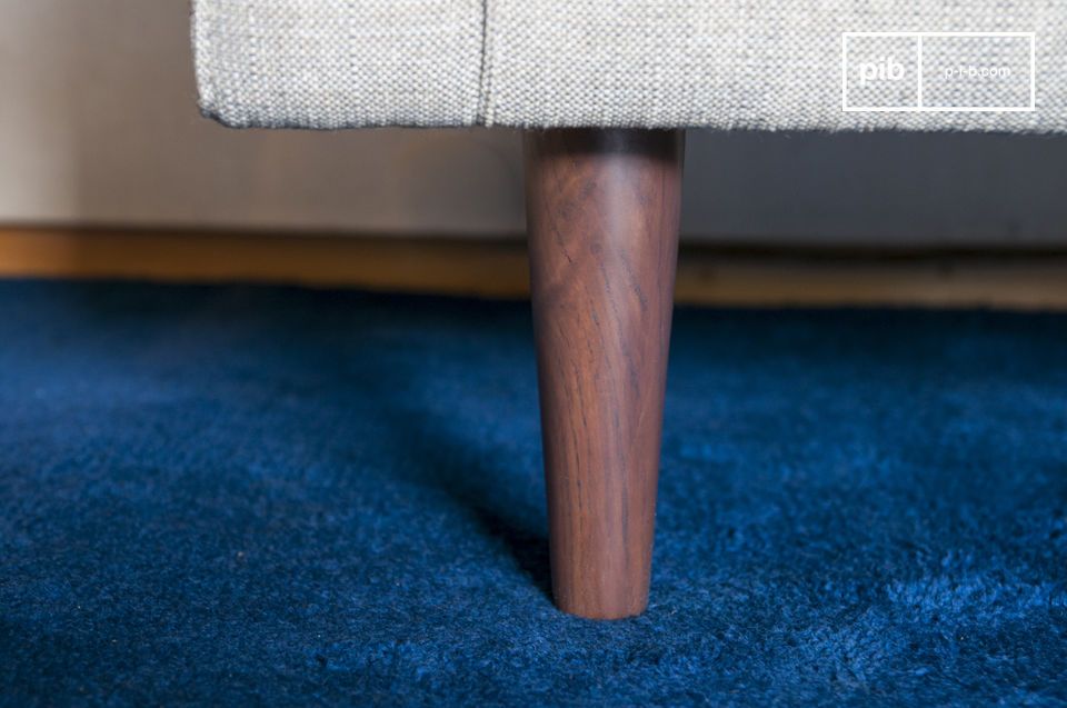 The base is made of a pretty brown wood that blends perfectly with the fabric.