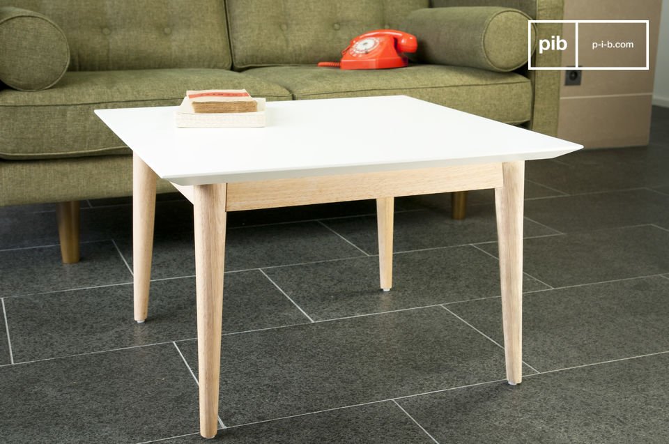 Square coffee table with white top and wooden base.