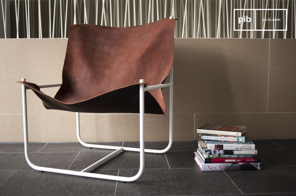 Beautiful leather armchair with Scandinavian design.