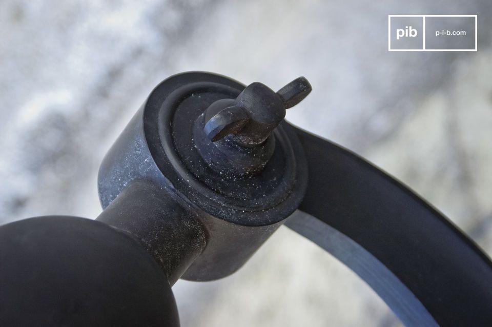 Rivet type screw that connects the base to the neck of the luminaire.