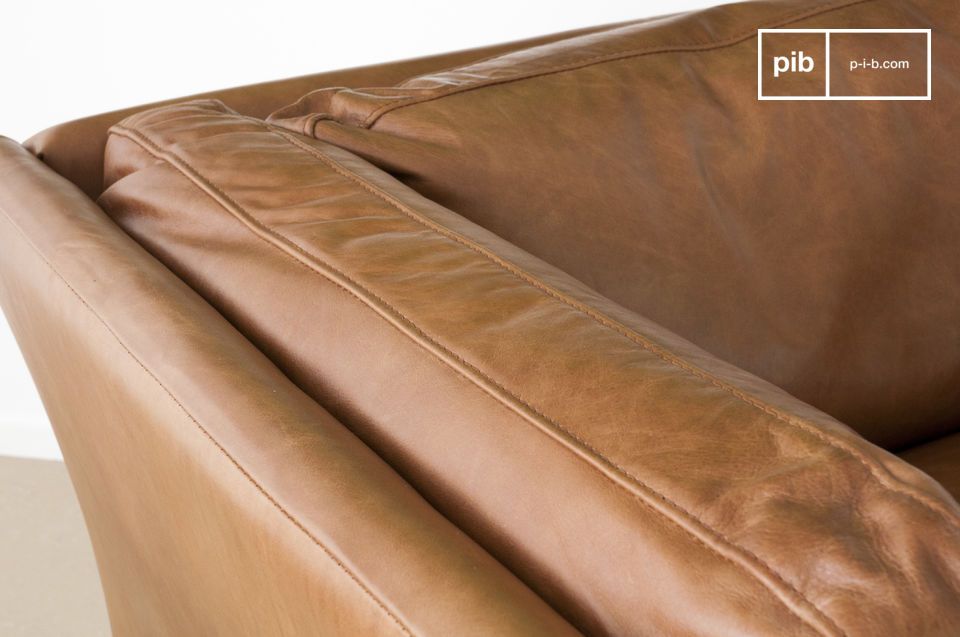 The seat cushion harmoniously matches the same-coloured frame.