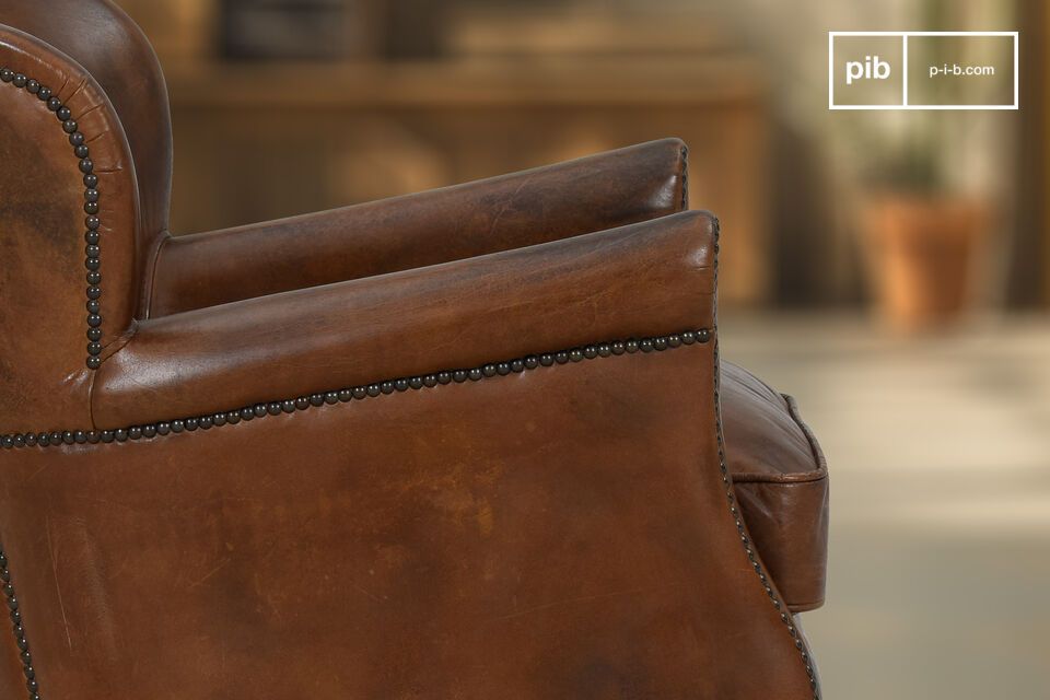 A compact and comfortable leather club chair.