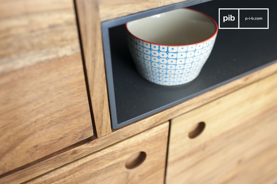 The cabinet has discreet round handles with inlays.