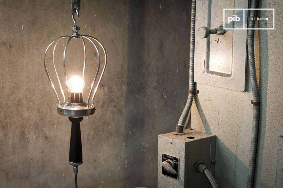 Charming hand lamp in a typically industrial style.