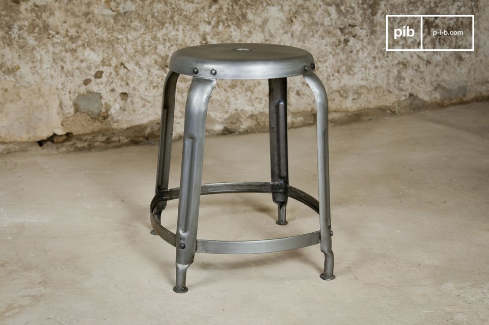 Beautiful grey stool in patinated metal.