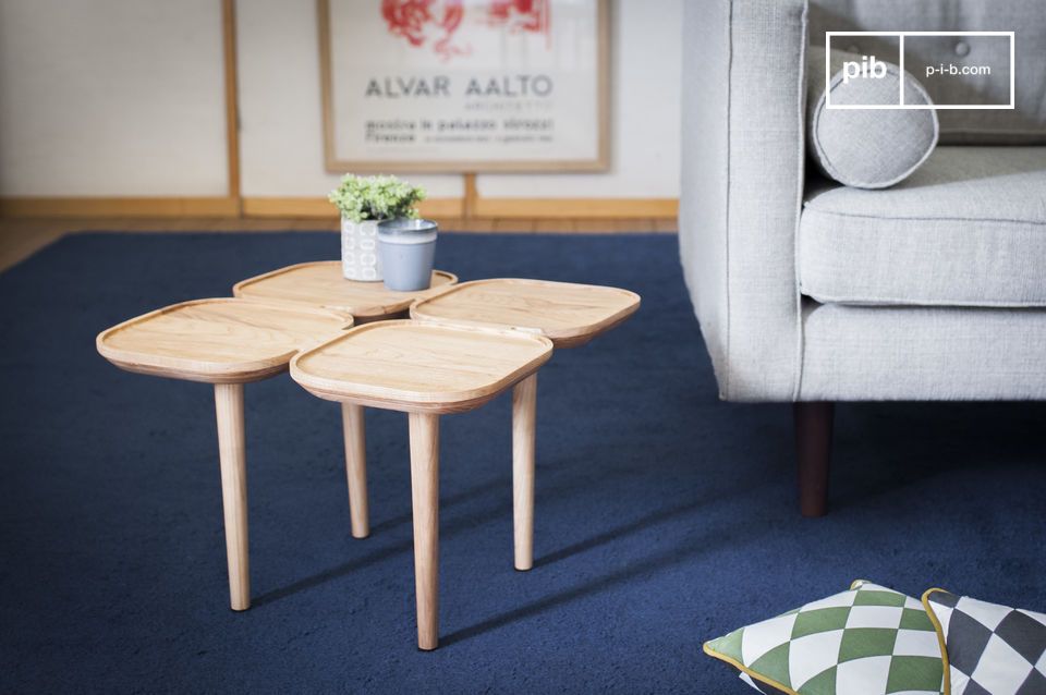 A solid ash side table with four retro tops.