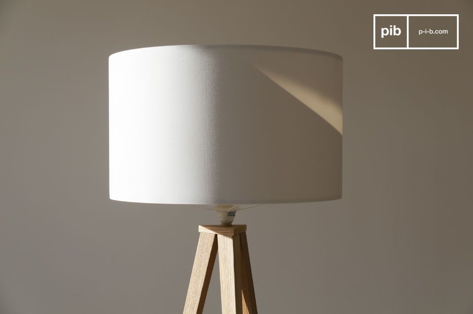 Beautiful white lampshade that blends perfectly with the wooden base.