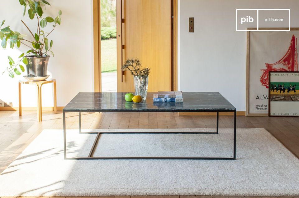 The table is inspired by the international style of the 1950s.