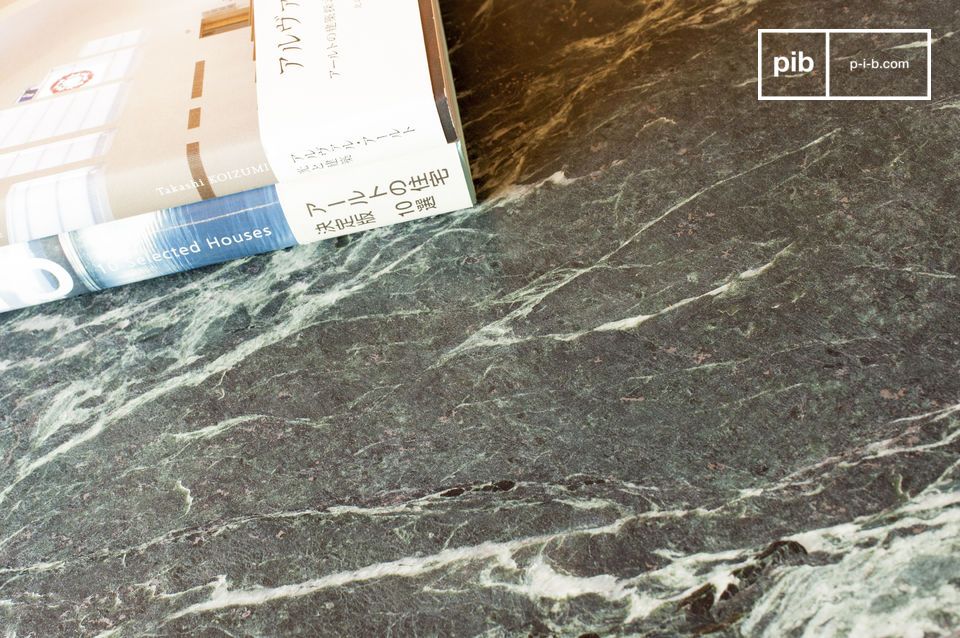 Beautiful deep green marble top with white veins.