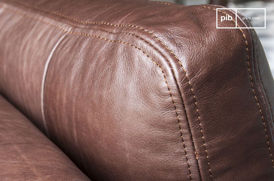 The leather is full grain aniline and deep brown, it will fit into any interior.