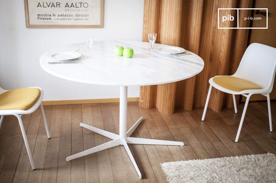 White table with soft and light lines in marble and aluminium.