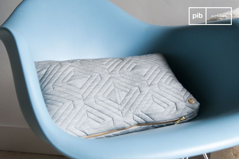 Elegant rectangular light grey cushion.