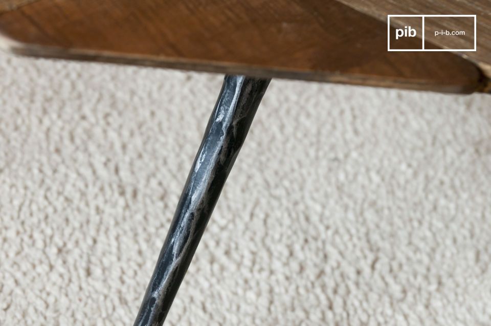 Beautiful patinated and textured metal legs with an organic look.
